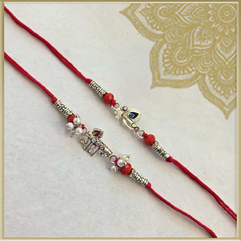 Krishna Flute & Mor Pankh Rakhi Set